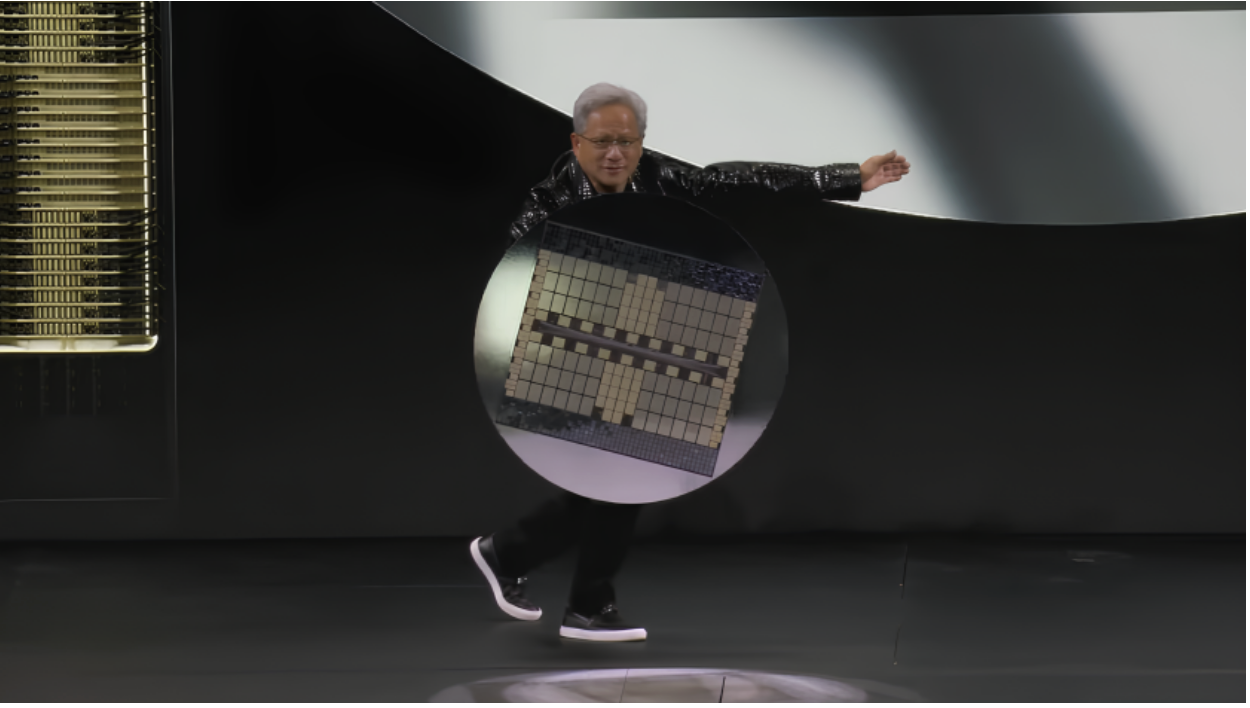 CEO of Nvidia Jensen Huang on stage at the 2025 CES showing the latest GPU chip for AI and other applications